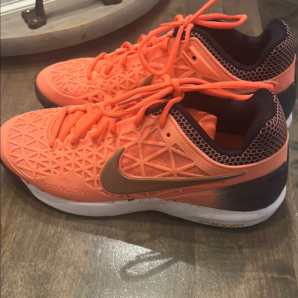 Nike Orange Sneakers with Gold Swoosh